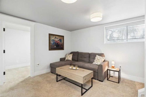 162 Fyffe Road Se, Calgary, AB - Indoor Photo Showing Living Room