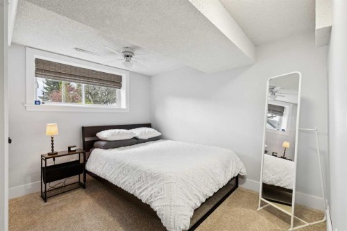 162 Fyffe Road Se, Calgary, AB - Indoor Photo Showing Bedroom