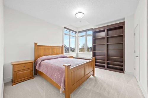 89 Evergreen Mount Sw, Calgary, AB - Indoor Photo Showing Bedroom
