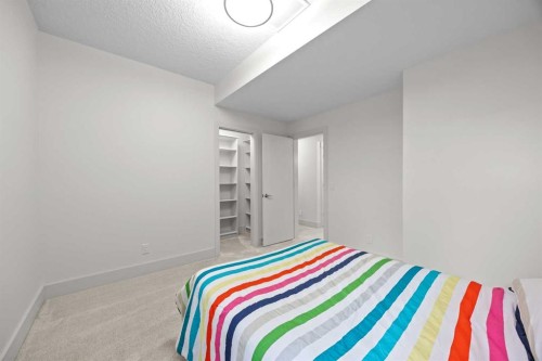 89 Evergreen Mount Sw, Calgary, AB - Indoor Photo Showing Bedroom