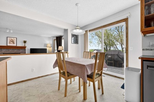 112 Hidden Ranch Crescent Nw, Calgary, AB - Indoor Photo Showing Dining Room