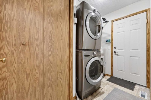 112 Hidden Ranch Crescent Nw, Calgary, AB - Indoor Photo Showing Laundry Room