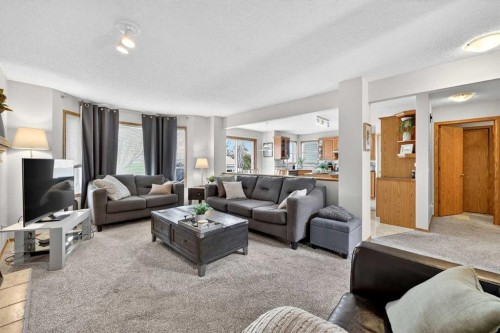 112 Hidden Ranch Crescent Nw, Calgary, AB - Indoor Photo Showing Living Room