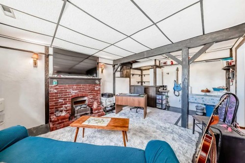 5539 Dalhart Road Nw, Calgary, AB - Indoor With Fireplace