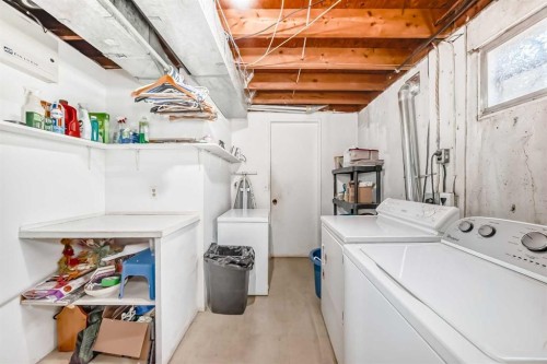 5539 Dalhart Road Nw, Calgary, AB - Indoor Photo Showing Laundry Room