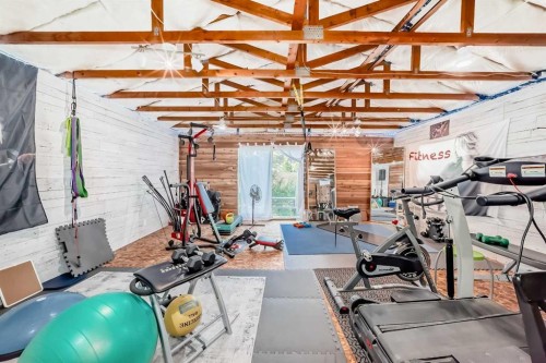 5539 Dalhart Road Nw, Calgary, AB - Indoor Photo Showing Gym Room