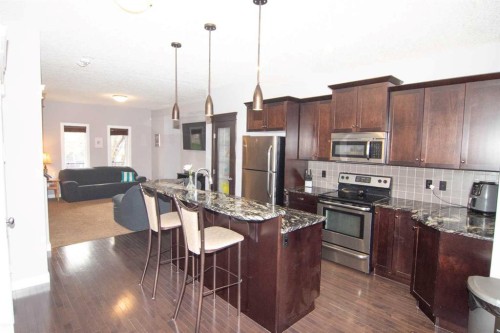 209 Evansdale Landing Nw, Calgary, AB - Indoor Photo Showing Kitchen With Stainless Steel Kitchen With Upgraded Kitchen