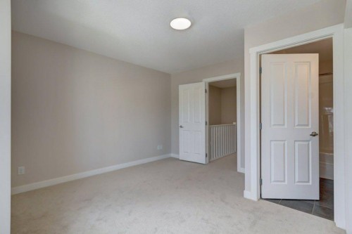 95 Aspen Hills Drive Sw, Calgary, AB - Indoor Photo Showing Other Room