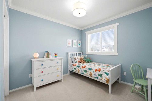 86 Everwillow Circle Sw, Calgary, AB - Indoor Photo Showing Bedroom