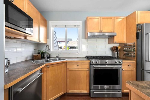 86 Everwillow Circle Sw, Calgary, AB - Indoor Photo Showing Kitchen With Stainless Steel Kitchen With Double Sink