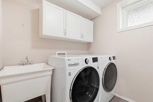 78 Everglen Way Sw, Calgary, AB - Indoor Photo Showing Laundry Room