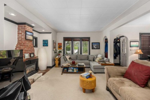 3035 4 Street Sw, Calgary, AB - Indoor Photo Showing Living Room With Fireplace