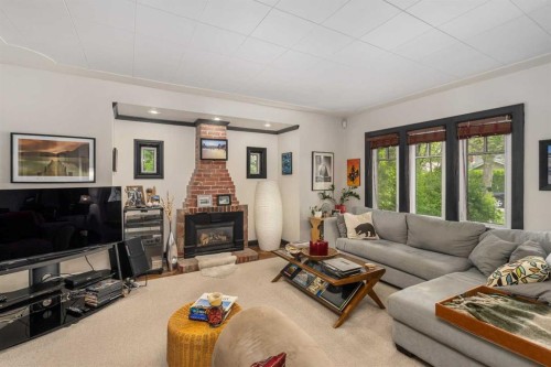 3035 4 Street Sw, Calgary, AB - Indoor Photo Showing Living Room With Fireplace