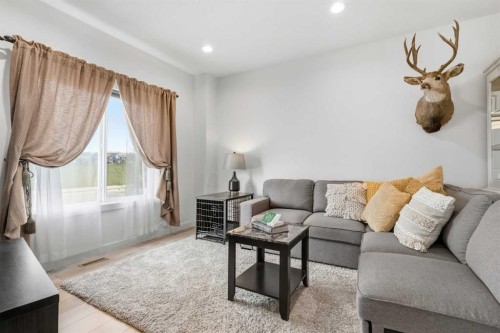 328 Bayview Street Sw, Airdrie, AB - Indoor Photo Showing Living Room