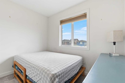 328 Bayview Street Sw, Airdrie, AB - Indoor Photo Showing Bedroom
