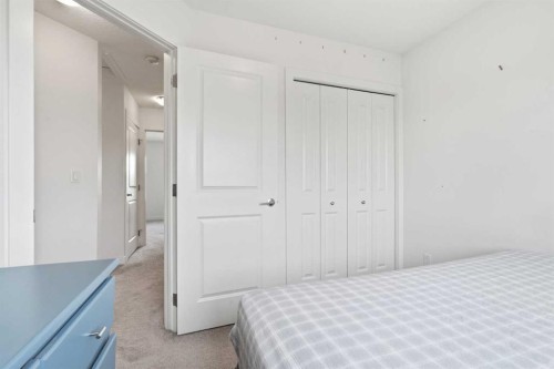 328 Bayview Street Sw, Airdrie, AB - Indoor Photo Showing Bedroom