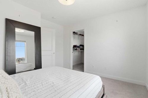 328 Bayview Street Sw, Airdrie, AB - Indoor Photo Showing Bedroom