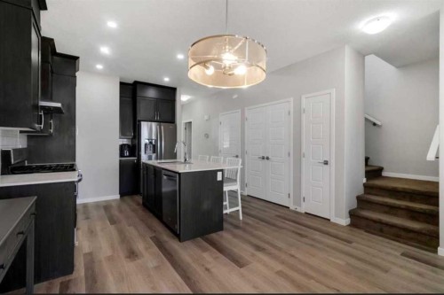 101-Dawson Drive, Chestermere, AB - Indoor Photo Showing Kitchen