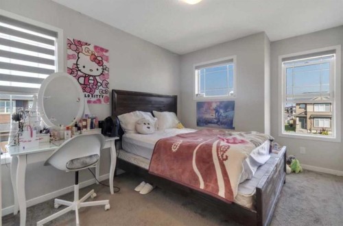101-Dawson Drive, Chestermere, AB - Indoor Photo Showing Bedroom