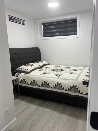 101-Dawson Drive, Chestermere, AB - Indoor Photo Showing Bedroom