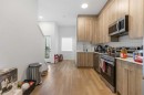 211-101 Panatella Square Nw, Calgary, AB  - Indoor Photo Showing Kitchen 