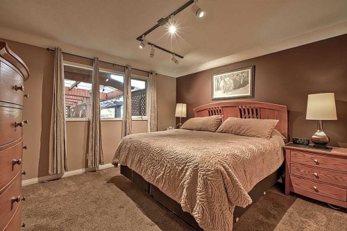 48 Deermont Way Se, Calgary, AB - Indoor Photo Showing Bedroom