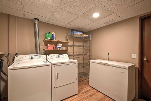 48 Deermont Way Se, Calgary, AB - Indoor Photo Showing Laundry Room