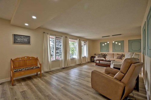 48 Deermont Way Se, Calgary, AB - Indoor Photo Showing Living Room