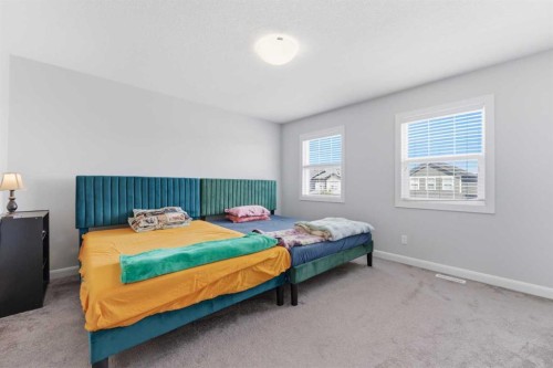 151 Evanscrest Park Nw, Calgary, AB - Indoor Photo Showing Bedroom