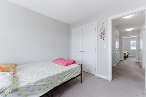 151 Evanscrest Park Nw, Calgary, AB - Indoor Photo Showing Bedroom