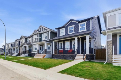 151 Evanscrest Park Nw, Calgary, AB - Outdoor With Deck Patio Veranda With Facade