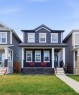 151 Evanscrest Park Nw, Calgary, AB  - Outdoor With Deck Patio Veranda With Facade 