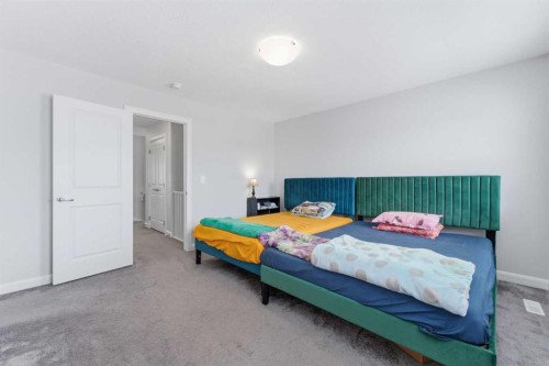151 Evanscrest Park Nw, Calgary, AB - Indoor Photo Showing Bedroom