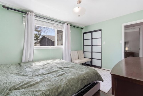 1703 110 Avenue Sw, Calgary, AB - Indoor Photo Showing Bedroom