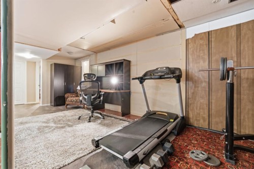 1703 110 Avenue Sw, Calgary, AB - Indoor Photo Showing Gym Room