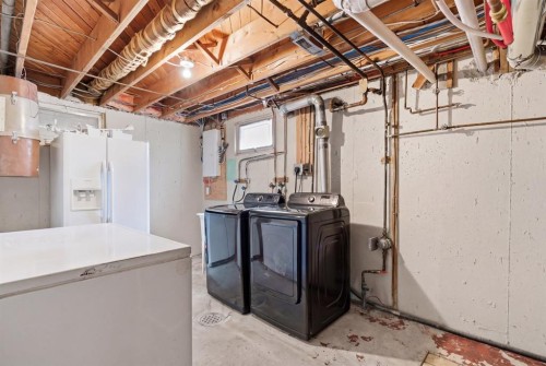 1703 110 Avenue Sw, Calgary, AB - Indoor Photo Showing Laundry Room