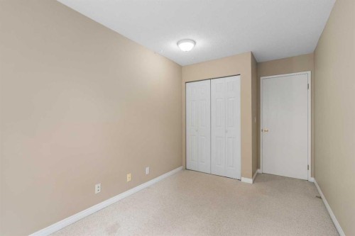 202C-5601 Dalton Drive Nw, Calgary, AB - Indoor Photo Showing Other Room