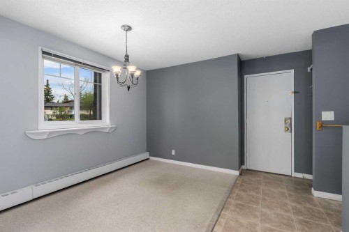 202C-5601 Dalton Drive Nw, Calgary, AB - Indoor Photo Showing Other Room