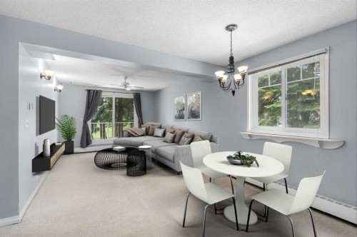 202C-5601 Dalton Drive Nw, Calgary, AB - Indoor Photo Showing Dining Room