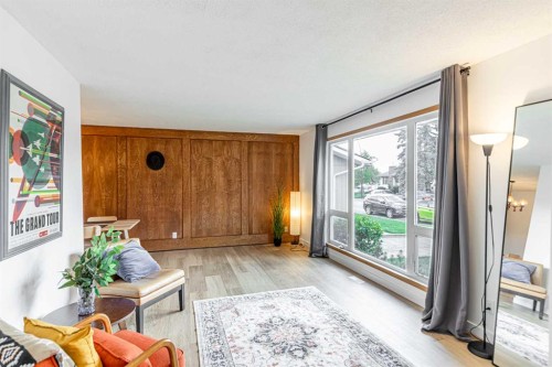 111 Lynnview Way Se, Calgary, AB - Indoor Photo Showing Living Room