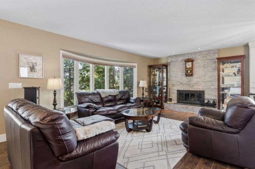 6751 34 Avenue Ne, Calgary, AB - Indoor Photo Showing Living Room With Fireplace