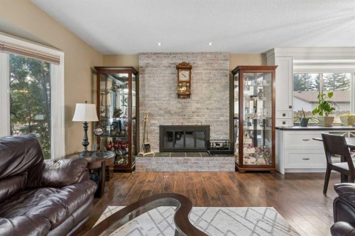 6751 34 Avenue Ne, Calgary, AB - Indoor Photo Showing Living Room With Fireplace
