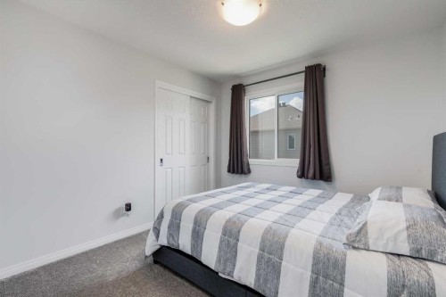 304 Windrow Crescent Sw, Airdrie, AB - Indoor Photo Showing Bedroom