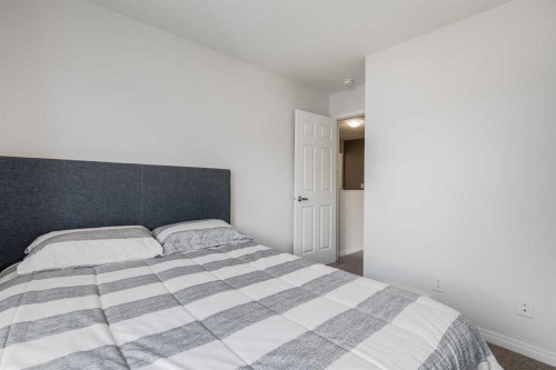 304 Windrow Crescent Sw, Airdrie, AB - Indoor Photo Showing Bedroom