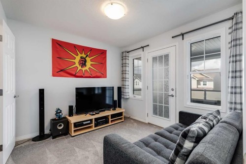 304 Windrow Crescent Sw, Airdrie, AB - Indoor Photo Showing Living Room