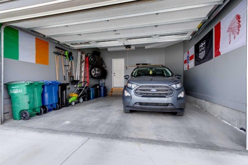 304 Windrow Crescent Sw, Airdrie, AB - Indoor Photo Showing Garage