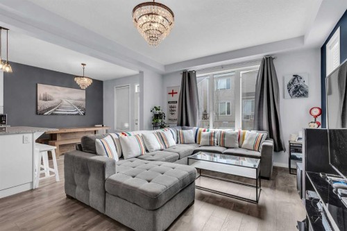 304 Windrow Crescent Sw, Airdrie, AB - Indoor Photo Showing Living Room