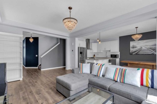 304 Windrow Crescent Sw, Airdrie, AB - Indoor Photo Showing Living Room