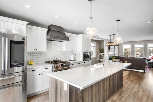 704 Stonehaven Drive, Carstairs, AB - Indoor Photo Showing Kitchen With Double Sink With Upgraded Kitchen