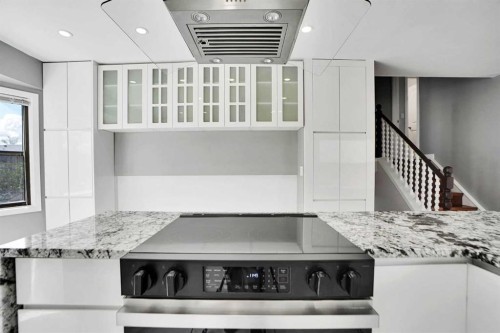 127 Woodstock Road Sw, Calgary, AB - Indoor Photo Showing Kitchen With Upgraded Kitchen